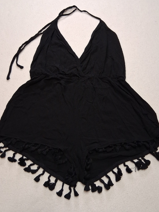 Lulus Pants - Lulu's Black Halter Romper with Tassel Trim